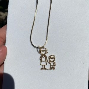 Mom with child pendant